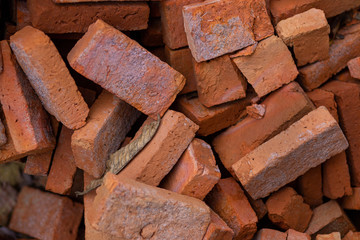Red bricks on building. On blurred background