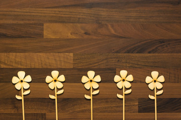 wood flowers on wooden table