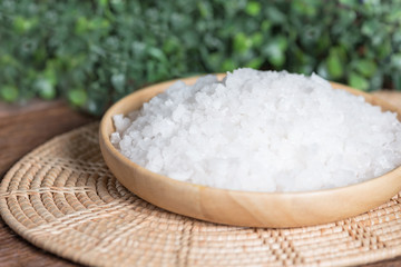 Sea salt in wood plate.