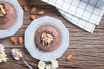 chocolate pudding topping of chocolate and almond sliced.