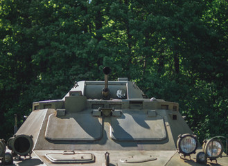 The concept of defence and military power. Close-up of tank