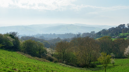 Idyllic rural view of English patchwork farmlands and beautiful surroundings in Devon, England