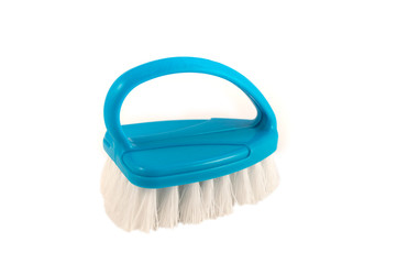 A small brush for cleaning and cleaning on a white background.