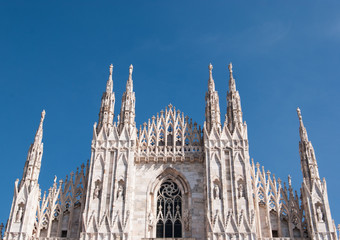 Fototapeta premium Top of the main facade of the Milan Cathedral