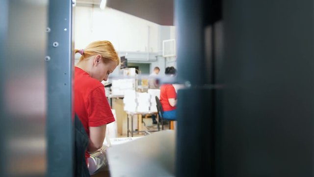 People at work in the publishing printing house