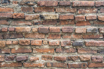 Old vintage orange brick wall background texture.
