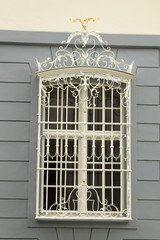 window with metal decoration on the facade