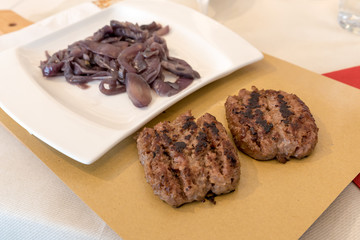 Piadina Romagnola with sausage and onion