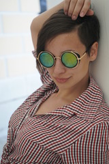Pretty hipster girl in sunglasses