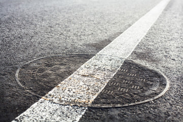 Manhole cover on the road