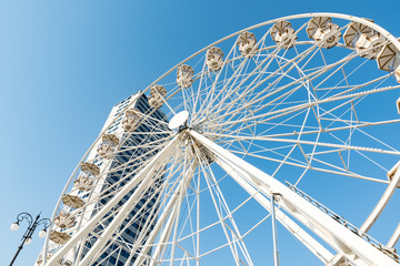 Ferris wheel with blue sky