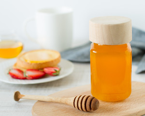 Healthy breakfast with toast, honey and strawberry