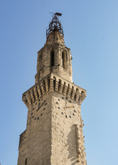 An ancient tower with a clock.