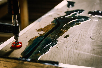  wood processing with epoxy resin and varnish. 