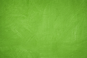 Fototapeta premium A green colored old wall texture background.