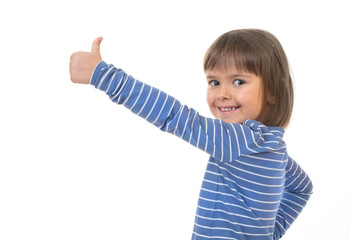A little kid pointing with her thumb up and showing a copy makes spaces for posting your information against the white background.