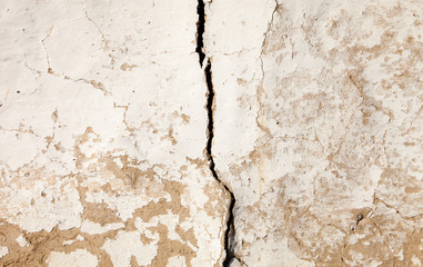 Old cracked whitewashed wall