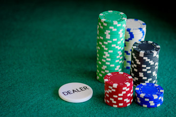 casino chips and dealer button