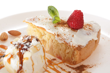 Apple biscuit cake and ice cream on plate isolated on white background