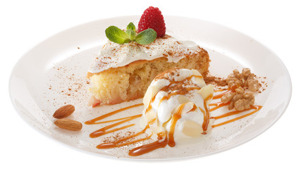 Apple biscuit cake and ice cream on plate isolated on white background