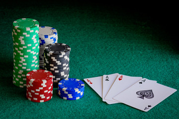 casino chips and aces poker