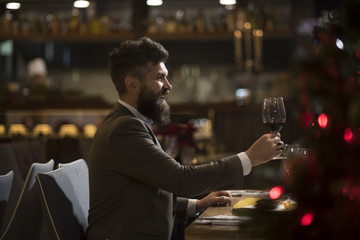 handsome man with a glass of champagne