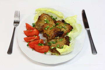 grilled pork chops with tomatoes and lettuce