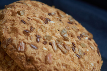 Vegan crunchy cookies with sunflower, flax seeds and sesame seeds isolated. Macro view