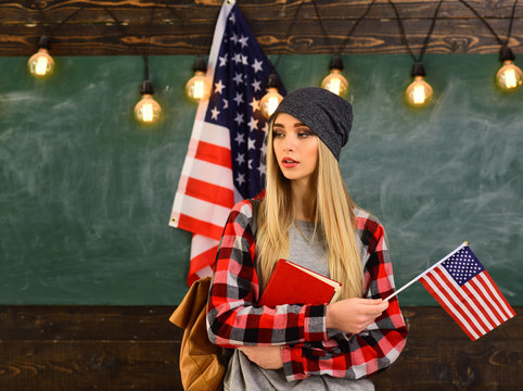 Concept with US flag and graduation hat symbol. Successful tutors are always on time and prepared. Mentor needs to have love for how he works. Students makes his studies priority.