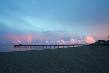 North Side of Deerfield Beach, Florida Pier under Blue Sky with Red Clouds After Dusk in Twilight