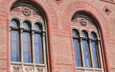Obraz premium Elements of the architecture of the old building. Vaulted windows. Close-up