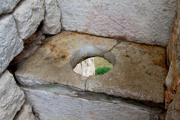 Medieval toilet on a fortress wall