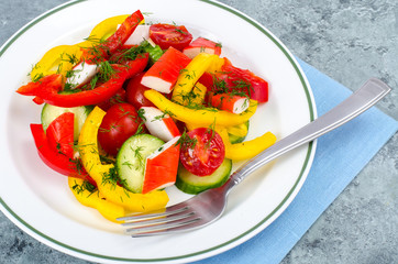 Crab sticks salad with fresh vegetables