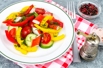 Crab sticks salad with fresh vegetables