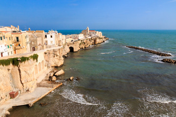 Fototapeta na wymiar Italy, Foggia, Apulia, SE Italy, Gargano National Park, Vieste. Old town of Vieste cityscape with medieval church at the tip of the peninsula of this fishing village in Gargano, Apulia, Italy.