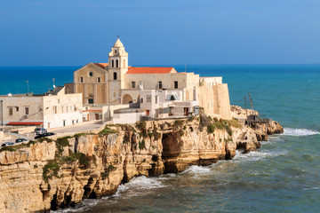 Italy, Foggia, Apulia, SE Italy, Gargano National Park,  Vieste. Old town of Vieste cityscape with medieval church of St. San Francesco at the tip of the peninsula in Gargano, Apulia, Italy.