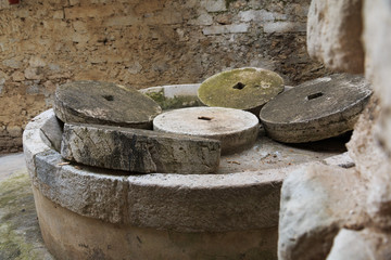 Italy, Foggia, Apulia, SE Italy, Gargano National Park,Vieste. Stone grinding wheels.