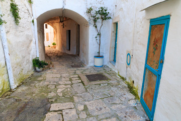 Italy, SE Italy, Ostuni. Narrow, arched old town . Blue Doorways.The 