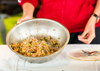 Vietnamese salad in a bowl of stainless steel, Hanoi, Vietnam. Close-up.