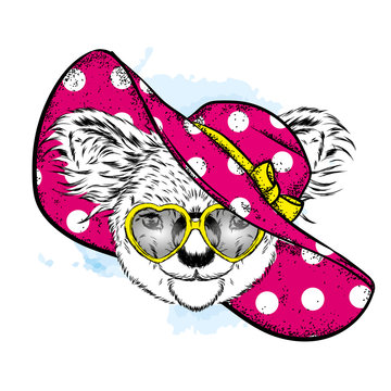 Funny koala in a beach hat and glasses. Bear cub in clothes and accessories. Hipster. Vector illustration.

