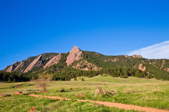 View of Flatirons Mountains seen from Chautauqua Open Space Park in Boulder Colorado