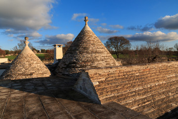 Italy, SE Italy, Region of Apulia, Province of Bari, Itria Valley,  Alberobello. A trullo house is a Apulian dry stone hut with a conical roof. UNESCO Heritage site.