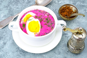 Dietary and healthy food. Soup with beets and eggs
