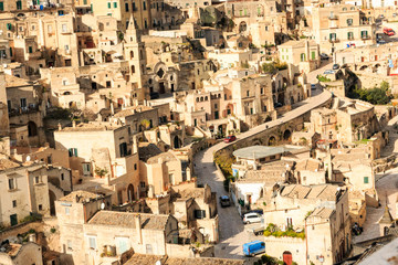 Italy, Southern Italy, Region of Basilicata, Province of Matera, Matera. The town lies in a small canyon carved out by the Gravina. Overview of town.