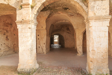 Fototapeta na wymiar Italy, Southern Italy, Region of Basilicata, Province of Matera, Matera. Small cobblestone streets and arched paths.