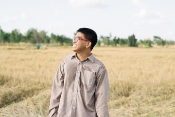 Brown Skin Farmer And His Rice Field