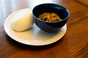 Nigerian Pounded Yam Served with Egusi Soup 