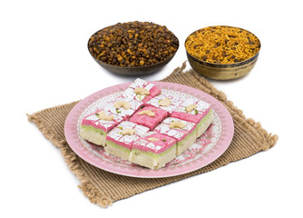 Indian Sweet Dryfruit Barfi Also Know As Cashew barfi, Mithai, barfee, Mawa Barfi, Mava barfi, khoya Burfi Indian Popular Sweet Made up of Coconut, Mawa, Milk and Sugar isolated on white background