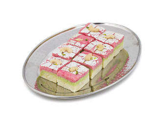 Indian Sweet Dryfruit Barfi Also Know As Cashew barfi, Mithai, barfee, Mawa Barfi, Mava barfi, khoya Burfi Indian Popular Sweet Made up of Coconut, Mawa, Milk and Sugar isolated on white background