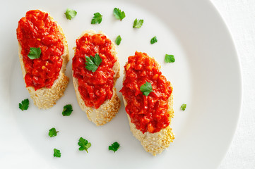 ajvar relish sandwiches decorated with cilantro
